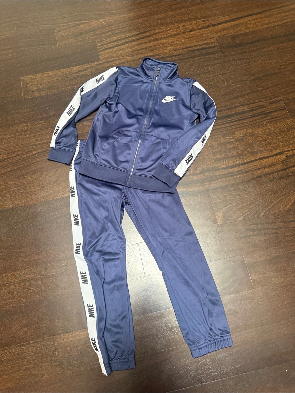 Nike Kids Navy Track Pants with White Logo Tape